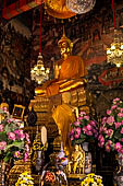 Bangkok Wat Arun - Main Buddha image inside the ubosot with two disciples.  